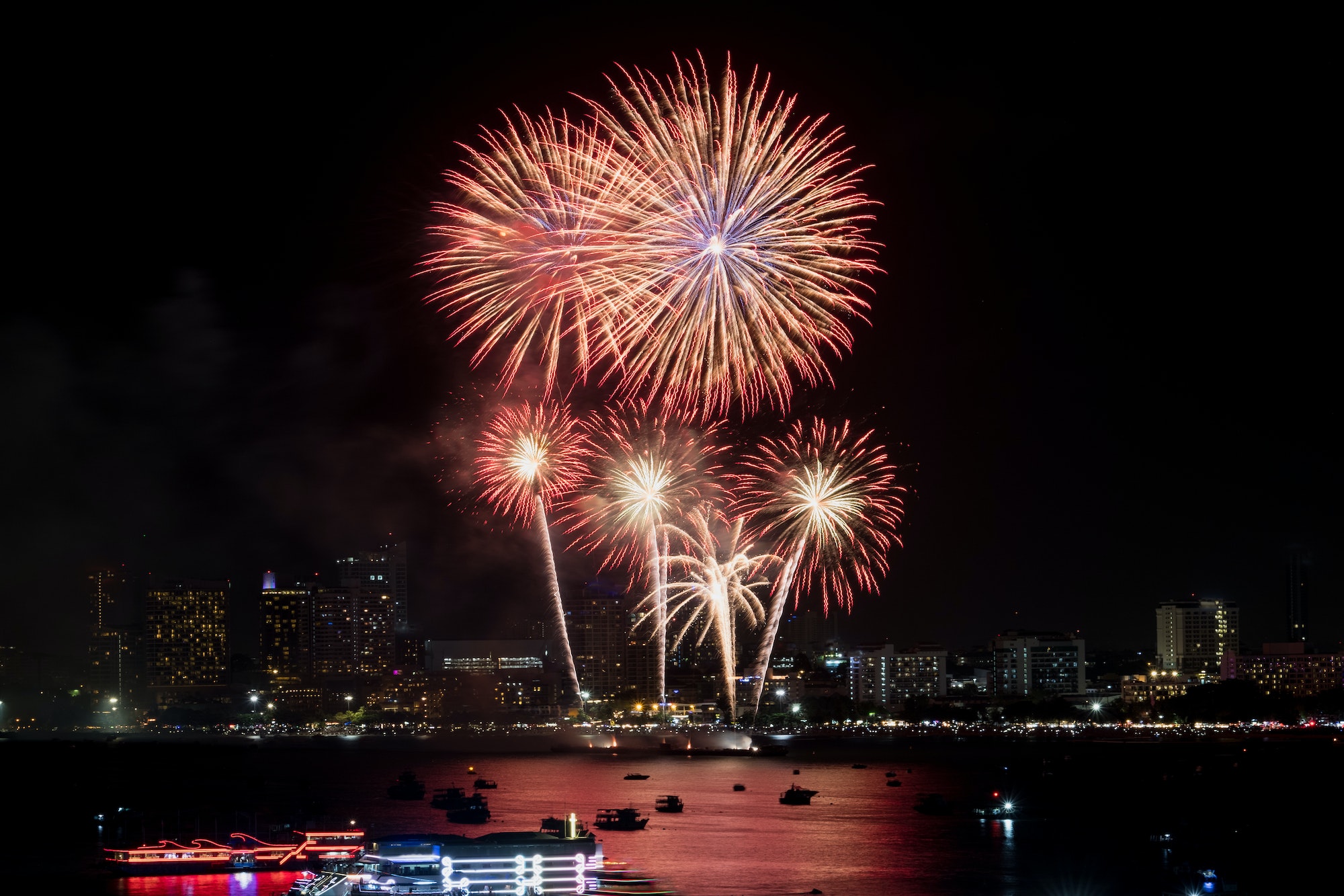 Firework blast in dark sky at night celebration new year count down